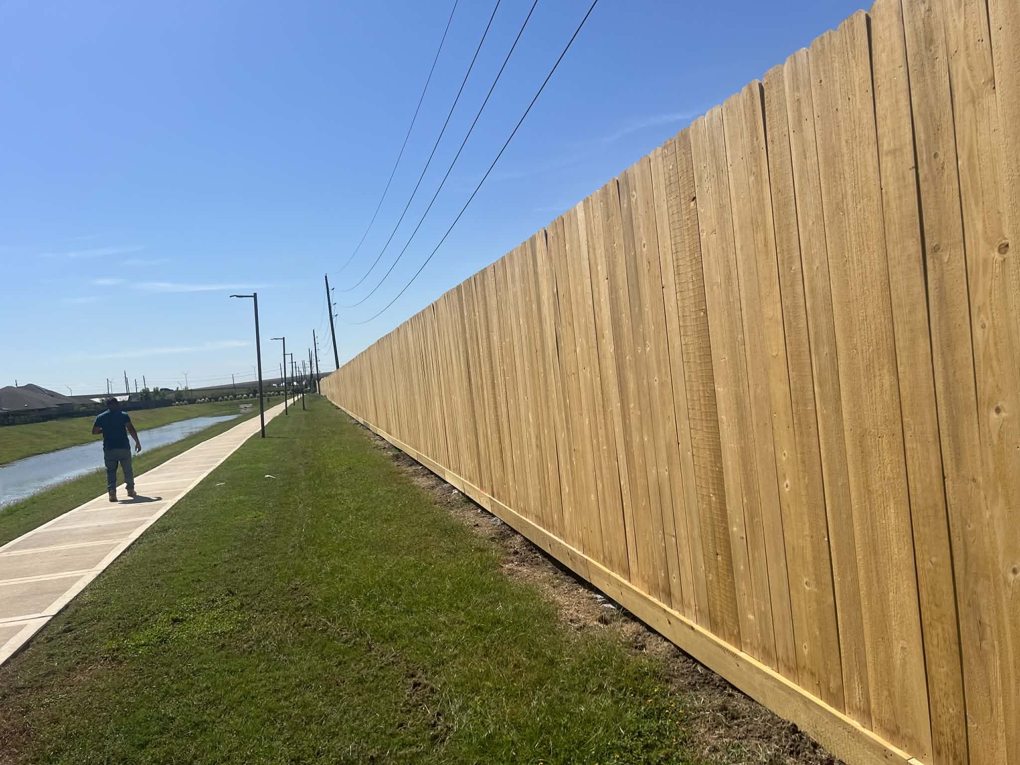 Long Cedar Fence Along Canal
